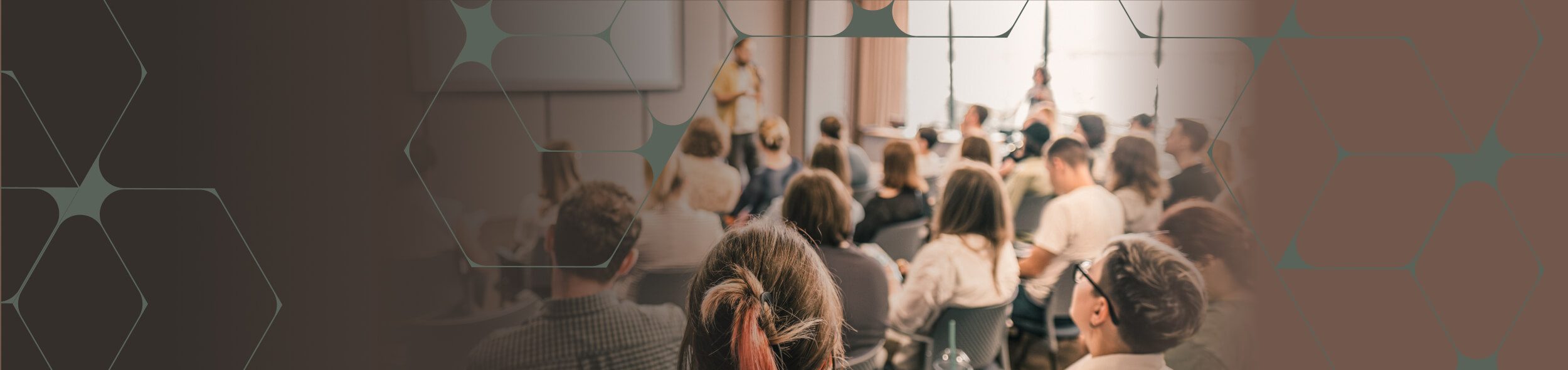 Audience Listening to a Speaker at a Conference