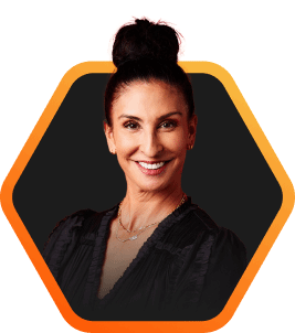 Friendly Portrait of Everpure Chief Legal Officer, Nikki Armstrong, with a Bun Hairstyle