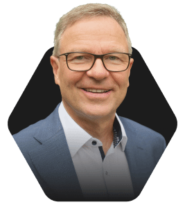 Professional Headshot with a Warm Smile featured in a hexagonal frame on a dark background