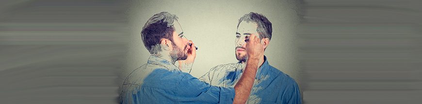 Create yourself concept. Good looking young man drawing a picture, sketch of himself on grey wall background. Human face expressions, creativity; Shutterstock ID 349217183; purchase_order: dupe; job: ; client: ; other: 