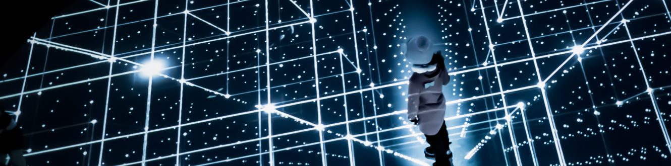 A person stands in a futuristic, grid-like structure with glowing lights and dotted lines.